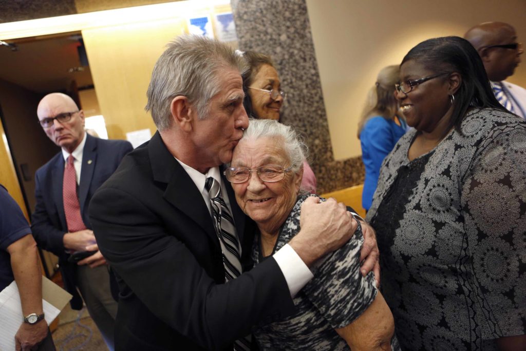 Steven Mark Chaney hugs his mother, Darla Chaney, for the first time in years after walking out of a Dallas courtroom this afternoon after a court reversed his 1987 murder conviction because of discredited bite mark testimony. Photographed on Monday, October 12, 2015. (Photo copyright Lara Solt)
