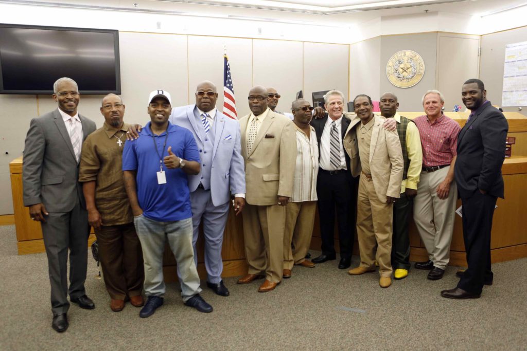 Steven Mark Chaney poses for a picture with other exonerees after a hearing in a Dallas courtroom where a court reversed his 1987 murder conviction because of discredited bite mark testimony. Photographed on Monday, October 12, 2015. (Photo copyright Lara Solt)